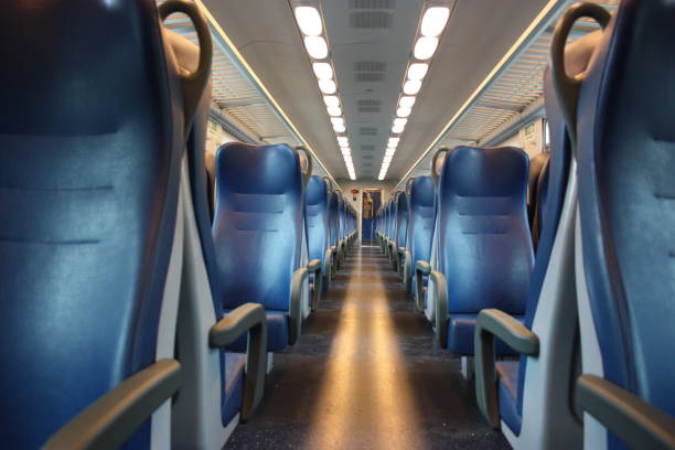 istock blue lined seats lined up along the corridor of a regional train with no passengers during the day in tuscany 1200178124