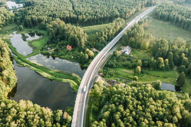 istock Aerial view of the flyover through the forest 1200179084