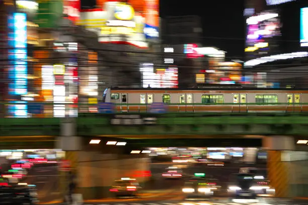 Photo of Panning of elevated train  in Tokyo