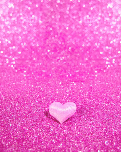 istock pink heart on a blurry, not sharp pink background with bokeh. Place for text. Valentine's Day 1200184089