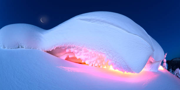istock Snowy cornice on the mountain at night 1200184159