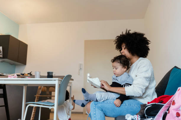 istock Mom and babies at home 1200185405