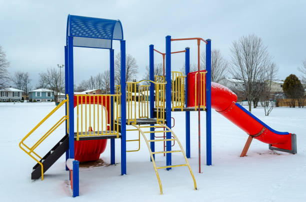 istock Colorful residential empty playground in the snow 1200190342