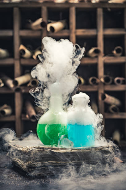 istock Magic alchemist laboratory full of medieval and old scrolls 1200198615