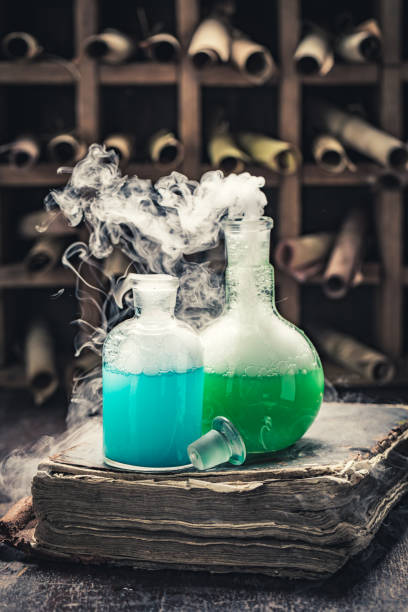 istock Vintage alchemist laboratory full of medieval and old scrolls 1200199656