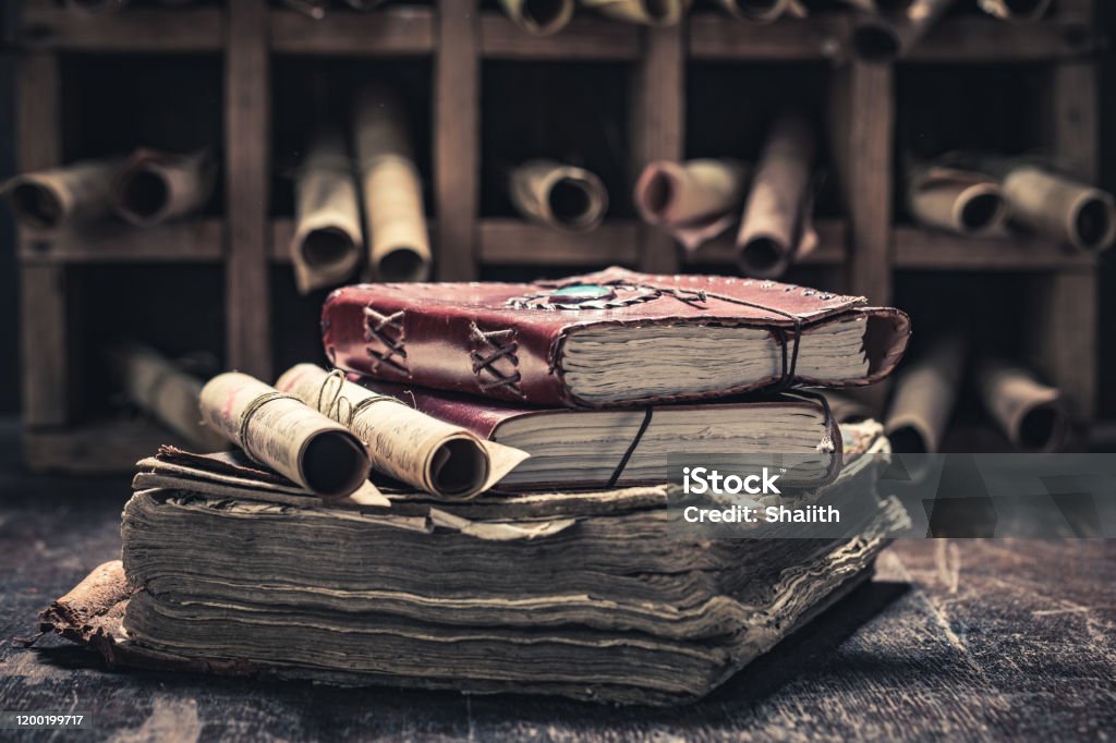 Magic scrolls and books in medieval library Medieval Stock Photo