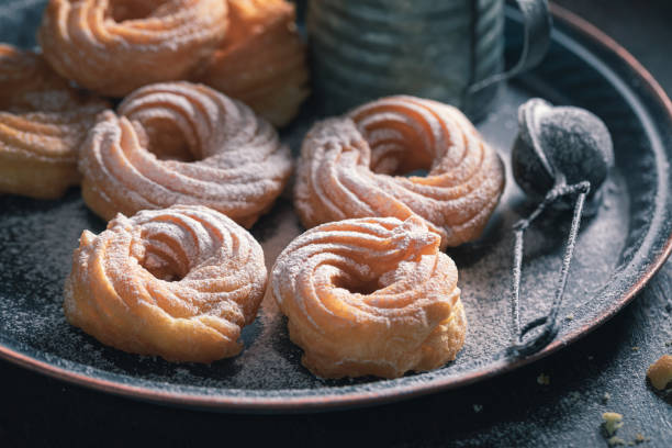 istock Hot and sweet spanish donuts ready to eat 1200200855