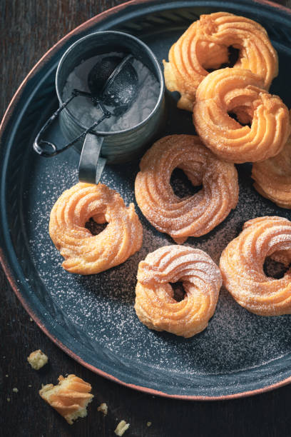 istock Yummy and sweet spanish donuts baked at home 1200201295