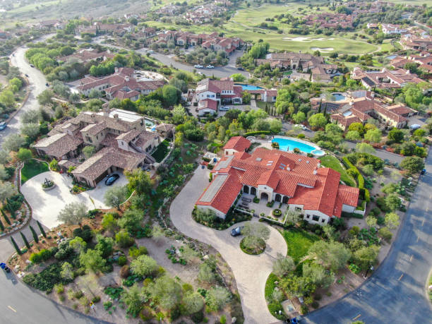 istock Big luxury executive house with pool located next the golf course in a private community 1200203424