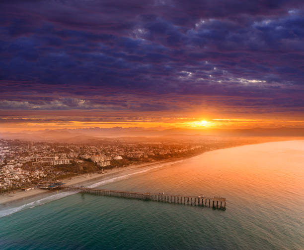 The pier and coastal neighborhoods in San Clemente, California, located in southern Orange County shot from an altitude of about 1500 feet over the beach.