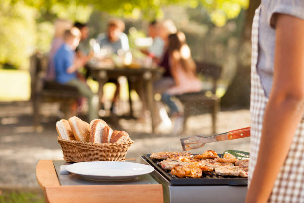 istock Preparing BBQ food for the family picnic 1200209607