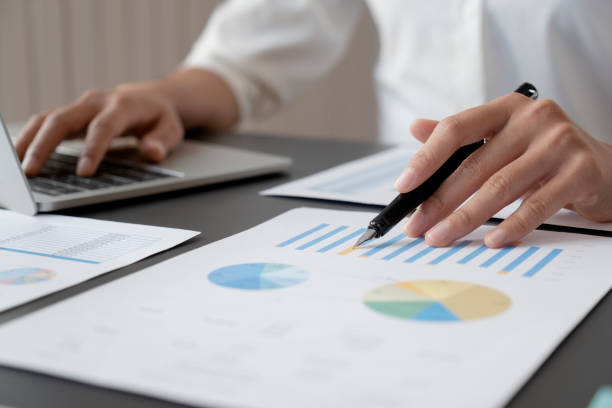 Businessman analyse investment marketing data. stock photo