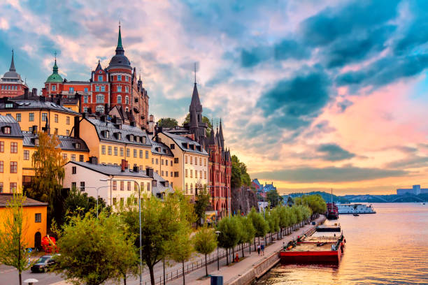 Stockholm, Sweden. Scenic summer sunset view with colorful sky of the Old Town architecture in Sodermalm district. Stockholm, Sweden. Scenic summer sunset view with colorful sky of the Old Town architecture in Sodermalm district sodermalm photos stock pictures, royalty-free photos & images
