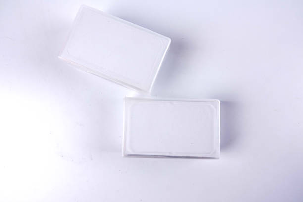 istock Two boxes of calling cards isolated on white. 1200217870