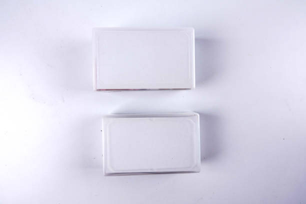 istock Two boxes of calling cards isolated on white. 1200217884
