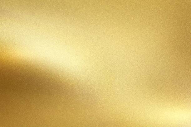 輝く光沢のある光、抽象的なテクスチャの背景を持つ金箔金属壁 - 金色 ストックフォトと画像