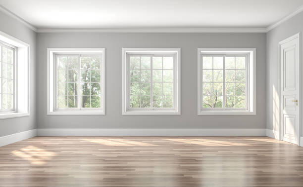 Classical empty room interior 3d render Classical empty room interior 3d render,The rooms have wooden floors and gray walls ,decorate with white moulding,there are white window looking out to the nature view. no people stock pictures, royalty-free photos & images