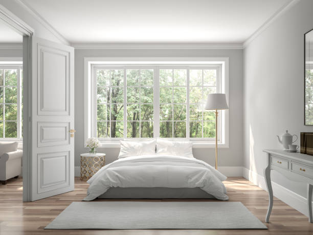 Classical bedroom and living room 3d render Classical bedroom and living room 3d render,The rooms have wooden floors and gray walls ,decorate with white and gold furniture,There are large window looking out to the nature view. bed decoration stock pictures, royalty-free photos & images