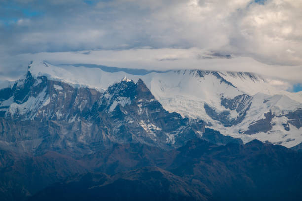 istock Mountain Peaks in the Clouds 1200237602
