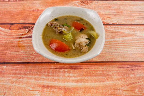 istock Chicken soup on wooden table. Top View. 1200240505