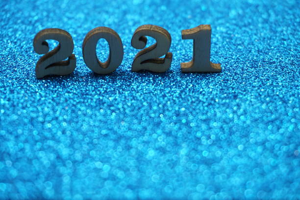istock Happy New year 2021 with space copy on blue glitter background 1200246186