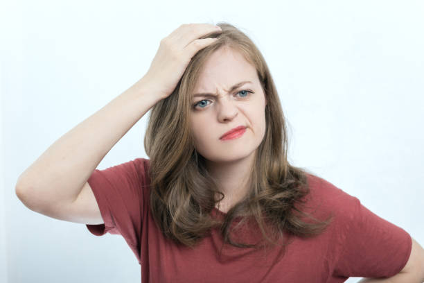 istock Young caucasian woman girl with puzzled, confused expression, think, forgot or remember something 1200246896