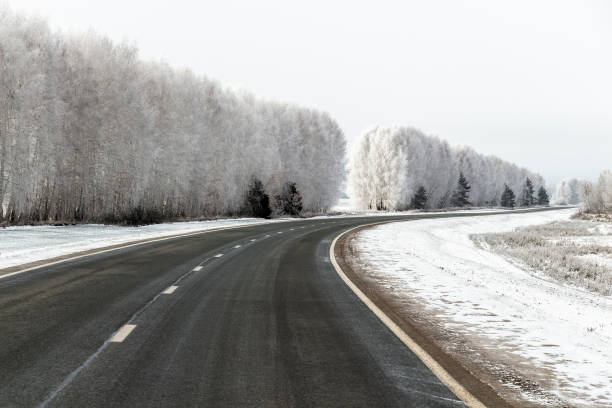 istock The road is in winter nature 1200247038