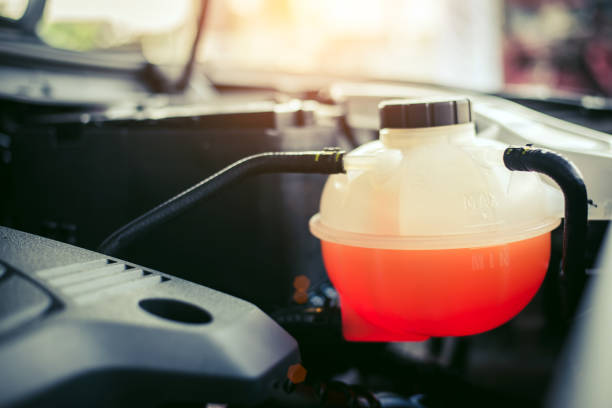 Close up of Coolant tank,Checking coolant level of car. Close up of Coolant tank,Checking coolant level of car. reservoir photos stock pictures, royalty-free photos & images