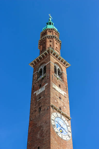 istock View of clock tower (Torre Bissara) at famous square (Piazza dei Signori) in Vicenza. 1200270346