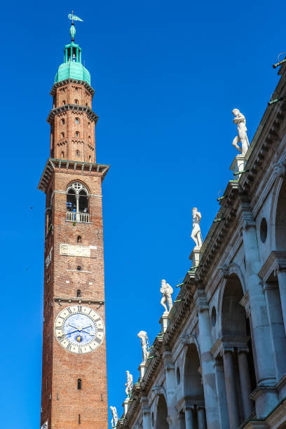 istock View of clock tower (Torre Bissara) at famous square (Piazza dei Signori) in Vicenza. 1200270561
