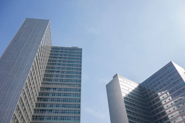 istock Commercial buildings with blue sky as background 1200275424