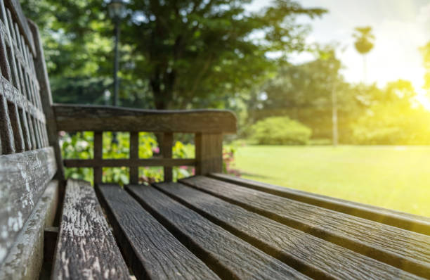 istock Empty Park wooden bench Closeup view. Wood exterior material. 1200278464