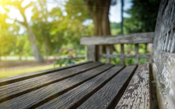 istock Empty Park wooden bench Closeup view. Wood exterior material. 1200278471