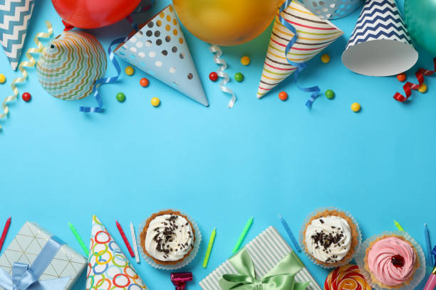 istock Composition with different birthday accessories on blue background, space for text 1200279179