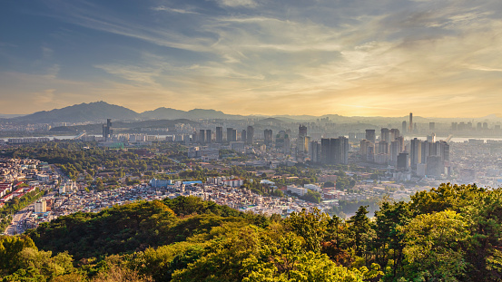 Panorama shot of Downtown Seoul Cityscape Skyline during a moody sunset light. Seoul, South Korea, Asia.