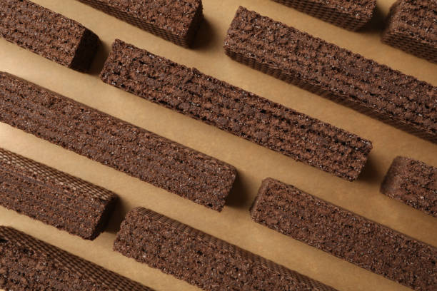 istock Flat lay with wafers on craft background, close up 1200280949