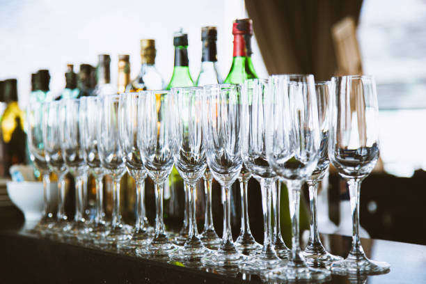 istock Empty champagne glasses in row on evening event 1200287671