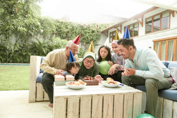 istock multi-generation family enjoying celebrating birthday 1200288491