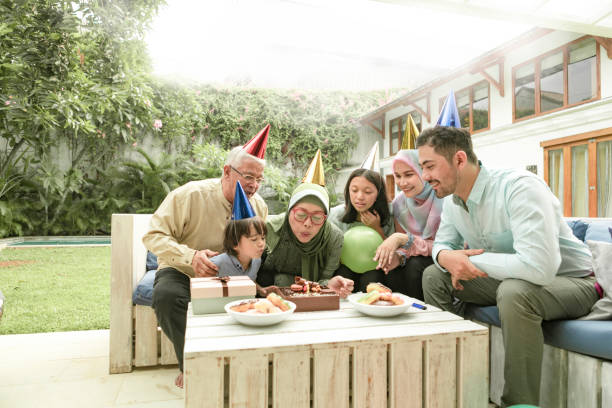 istock multi-generation family enjoying celebrating birthday 1200288726