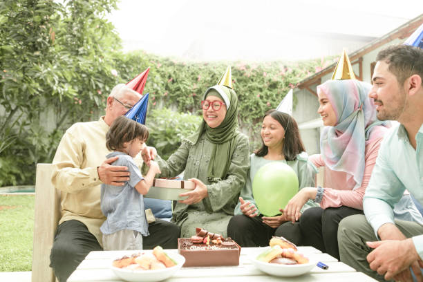 istock multi-generation family enjoying celebrating birthday 1200289016
