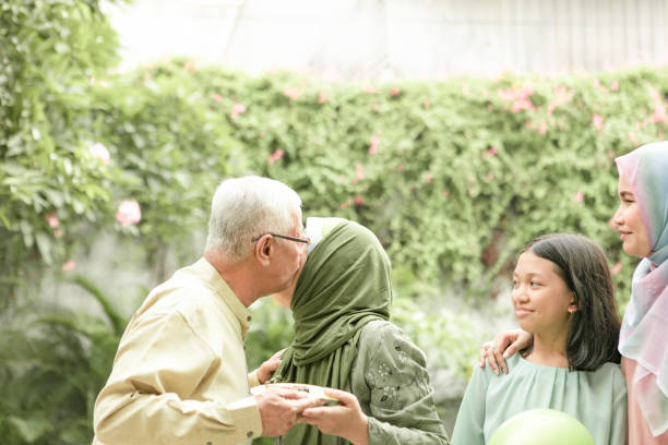 istock multi-generation family enjoying celebrating birthday 1200290241