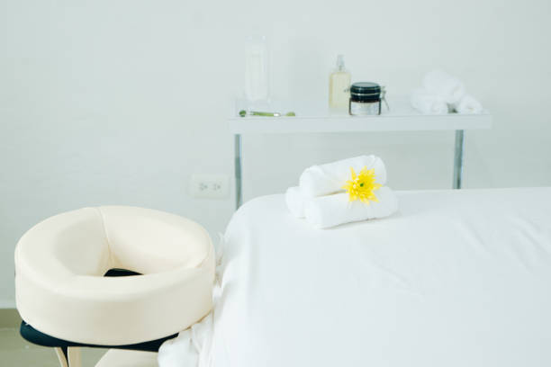 istock massage room in spa saloon. white massage table 1200291858