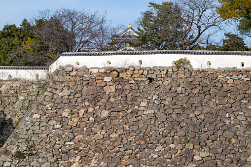 january,08,2020 okayama castle japan : It is one of the stone walls of Okayama Castle, and it is a stone wall made by the method of \