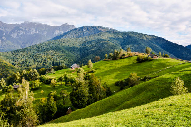 istock Green hills in mountain valley. spring landscape 1200292211