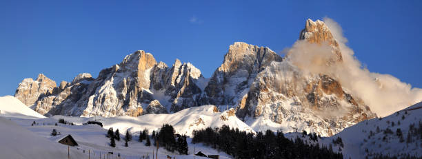 Beautiful winter landscape of Dolomitic group of Pale di San Martino as seen from Passo Rolle on the Italian Alps. Trento, Italy. stock photo