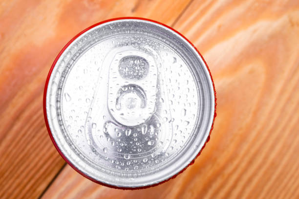 istock Can of soda lemonade with water drops in macro view 1200298013