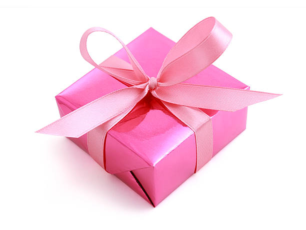istock Pink gift wrapped present with rosy satin ribbon bow 120030179