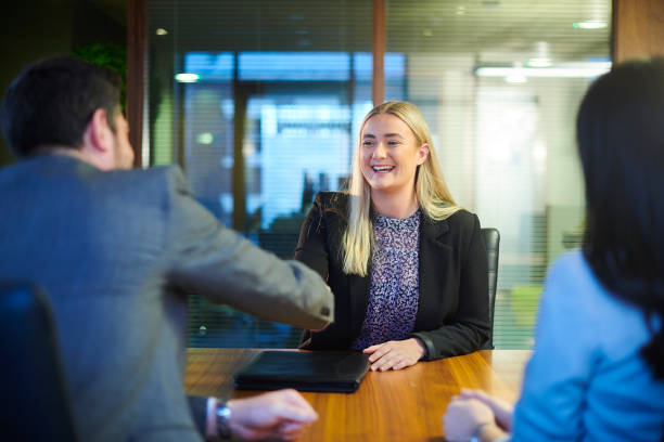 first job interview - gesturing interview business sitting imagens e fotografias de stock