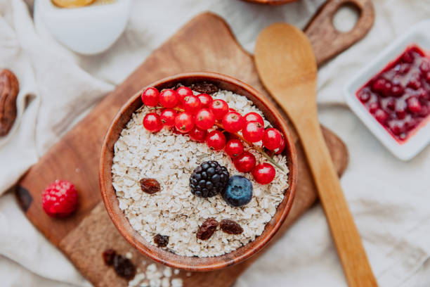 istock Healthy breakfast - oatmeal with berries. Top view 1200305504
