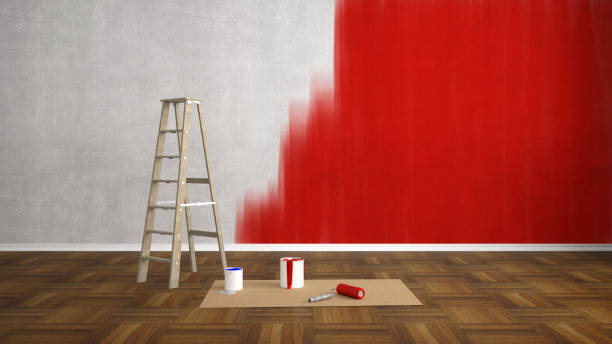 istock renovate living room with color wall and paint roller 1200312709